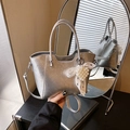 Metallic silver bucket bag with pleated texture and pearl lace bow charm detail - Silver (With Pendant)