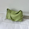 Light green dumpling bag in lychee leather with lace and pearl pendant detail - Green (With Charm)