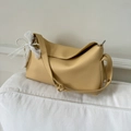 Yellow lychee pattern leather dumpling bag with white lace pearl bow charm - Yellow (With Pendant)