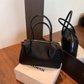 Minimalist black lychee pattern leather tote bag with silver hardware and thin handles - Black