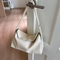 Minimalist beige dumpling bag in lychee pattern leather for versatile shoulder carry - White (Without Charm)
