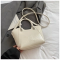 Modern off-white bucket bag with pleated texture and stylish round handles - White Without Pendant