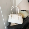 Chic beige lychee textured Boston tote bag with dual handles and top zipper closure - White