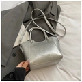 Silver wrinkled metallic bucket bag with dual handles and fashion slogan branding - Silver No Pendant