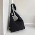 Minimalist black nylon tote bag with adjustable shoulder strap for women - Black