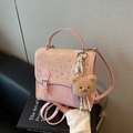 Pink mini crossbody bag with crystal accents and brown teddy bear charm on leather - Pink