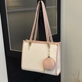 Chic cream and pink embossed leather tote bag with F-letter patterns and mini charm - White and Pink