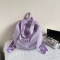 Lightweight lavender nylon backpack for women featuring durable straps and modern style - Purple