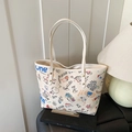 Chic cream white graffiti tote bag with colorful hand-drawn patterns and metal rivets - White