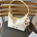 Creamy hobo bag with pale yellow trim, adjustable strap, and cute bear plush charm - With Charm / White