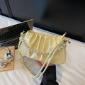 Pale yellow ruched cloud bag with pearl chain detail for elegant shoulder or hand carry - Yellow