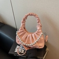 Pink pleated cloud bag with elegant pearl chain strap and matching crossbody handle - Pink