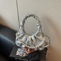 Silver metallic pleated cloud bag featuring decorative pearl chain and shoulder strap - Silver