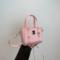 Rosafarbene Mini-Tragetasche aus Leder mit Saffiano-Prägung und silbernem Dekor - Rosa