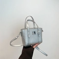 Mini borsa tote argento metallizzato in ecopelle con un'elegante fibbia quadrata - Argento