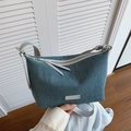 Blue denim hobo shoulder bag with grey leather straps and metal brand plate - Silver