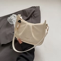 Chic beige pleated hobo bag with heart pendant chain and leather strap - Off White
