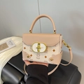 Pink and beige crossbody box bag with bear pattern and gold metal lock buckle - Off-white