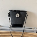 Mini dark gray denim and black leather bucket bag with silver chain and peanut charm - Black