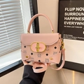 Pink crossbody bag with cute cartoon bear print and stylish golden metal hardware - Pink