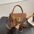 Bolso bandolera vintage marrón con patrones de osos y cierre metálico dorado - Marrón