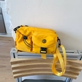 Fashionable bright yellow nylon crossbody bag with multi-pocket design and strap - Yellow