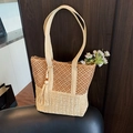 Handwoven straw tote bag in khaki with hollow grid design and decorative wooden bead tassel - Beige