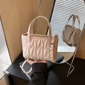 Beige quilted shoulder bag with V-shaped stitching and subtle rhinestone embellishments - Pink