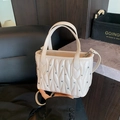 Quilted cream crossbody bucket bag with rhinestone details and top handle - White