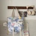 Blue tie-dye canvas tote bag with cloud pattern and plush star and bone charms - Blue Crossbody