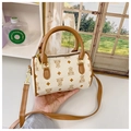 Detailed view of mini Boston bag with bear monogram print and leather top handles - White