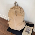 Minimalist khaki backpack with durable nylon fabric and woven zipper pull decoration - Khaki