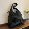 Black denim and faux leather tote bag with lace ruffle detail for women's fashion - Black
