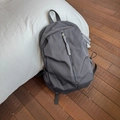 Minimalist charcoal grey water-resistant backpack with vertical zipper for daily travel - Gray