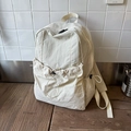 Cream white nylon backpack with drawstring front pocket and adjustable side buckles - Off White