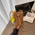 Khaki hand-woven straw crossbody phone bag with tassel and sunflower charm detail - Khaki