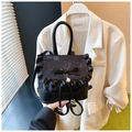 Detail of black gothic lace backpack with satin bow, ruffles and pearl pendant decor - Black