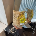 Handmade woven straw crossbody bag in beige with yellow flower charm and tassels - Off White