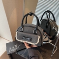 Ballet-style gray denim shell bag with cream lace trim and black bow detail - Black
