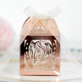 Detail of rose gold laser-cut candy box with horse pattern and white organza ribbon - Reflective Rose Gold