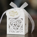 Elegant white laser-cut wedding favor box with heart patterns and gold thank you tag - White