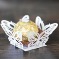 Elegant laser-cut butterfly cupcake wrappers in white for wedding party favors - White