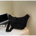 Detailed close-up of a black canvas crossbody bag with durable zippers and a woven puller - Black Large