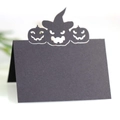Détail macro des marque-places citrouille noire découpés au laser pour Halloween - Noir
