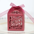 Detail of laser-cut burgundy rose wedding favor box with a matching chiffon ribbon bow - Dark Red