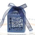 Detail of laser-cut rose patterns on dark blue pearlescent candy box with chiffon ribbon - Magic Blue