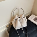 Elegant beige velvet bucket bag with silver butterfly charm and pearl tassels - Off-white