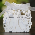 Laser cut white wedding favor box featuring bride and groom silhouette with silk ribbon - White