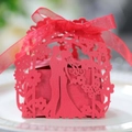 Detailed laser-cut red paper candy box with romantic silhouette and silk ribbon tie - Pearlescent Red