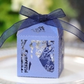 Detail of laser-cut wedding favor box in purple blue cardstock with navy organza ribbon - Sapphire Blue